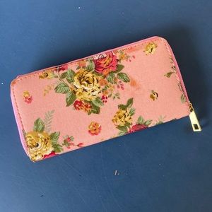 Pink floral wallet with zipper and wristlet